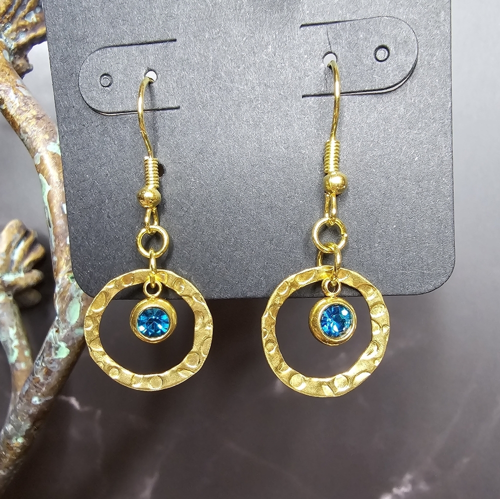 Drop Earrings With Teal Rhinestone Hanging In Brass Embossed Hollow Round Disc